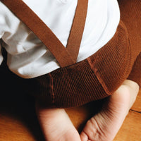 Collant-bebe-bretelle-dos-