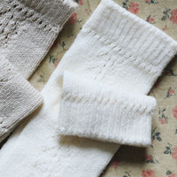 Chaussettes hautes ajourées crème
